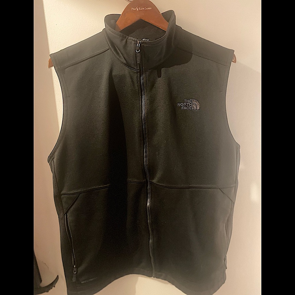 Black North Face vest.